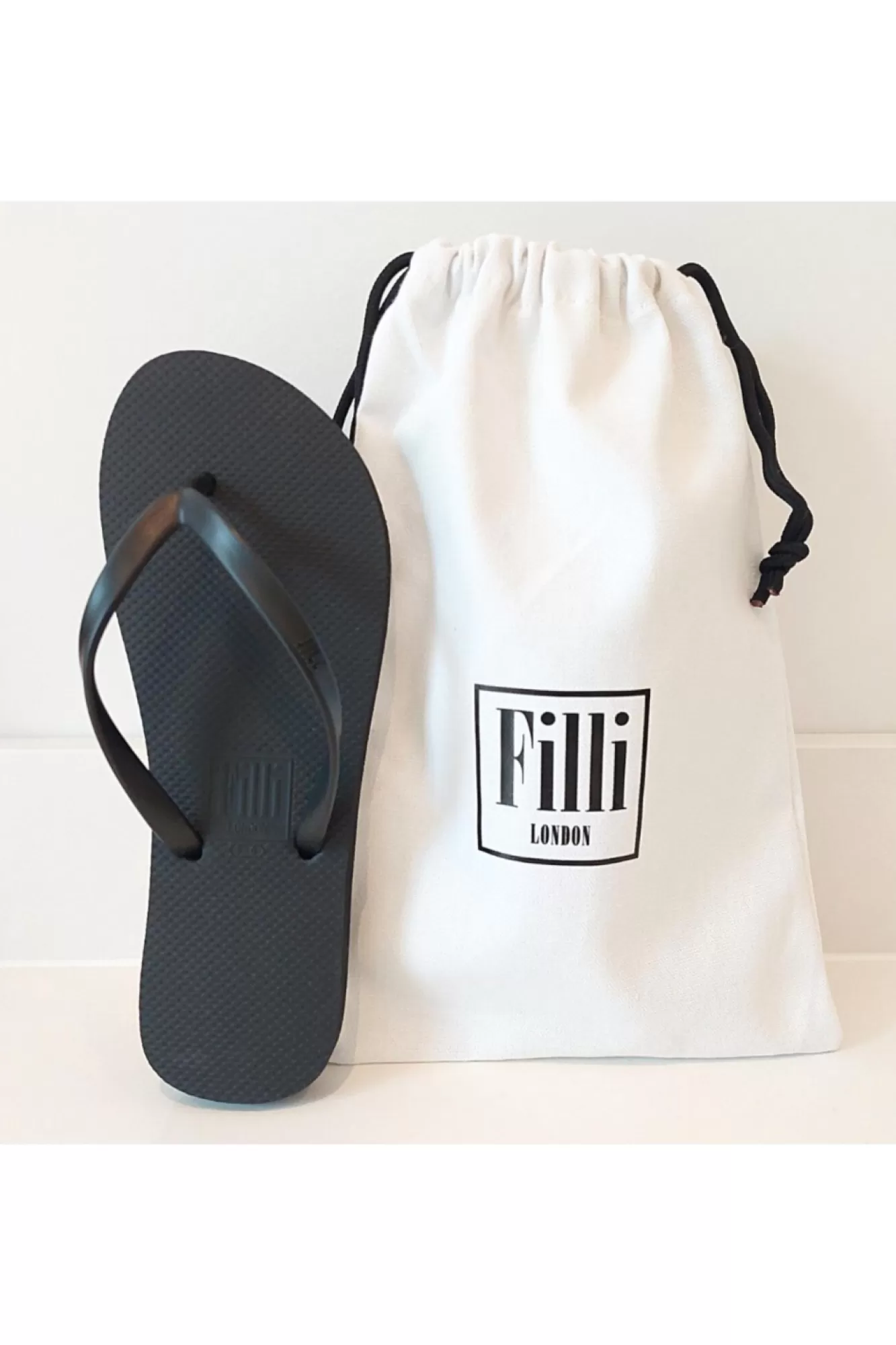 Flats^Filli London Naked Flip Flops In Black